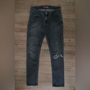 Vintage distressed Levi 504 “Tilted” grey jeans. Size 7 medium skinny jeans.